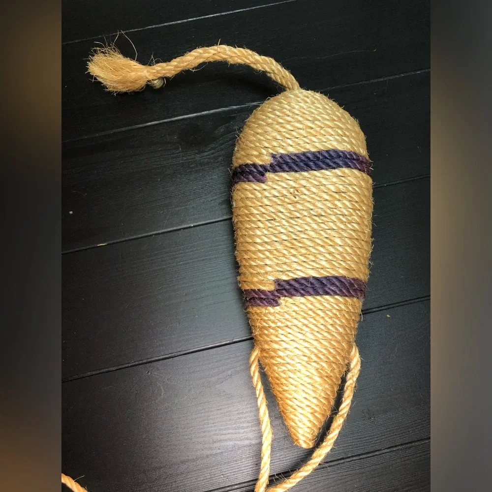 Decor toy mouse for a cat made of jute rope isolated.